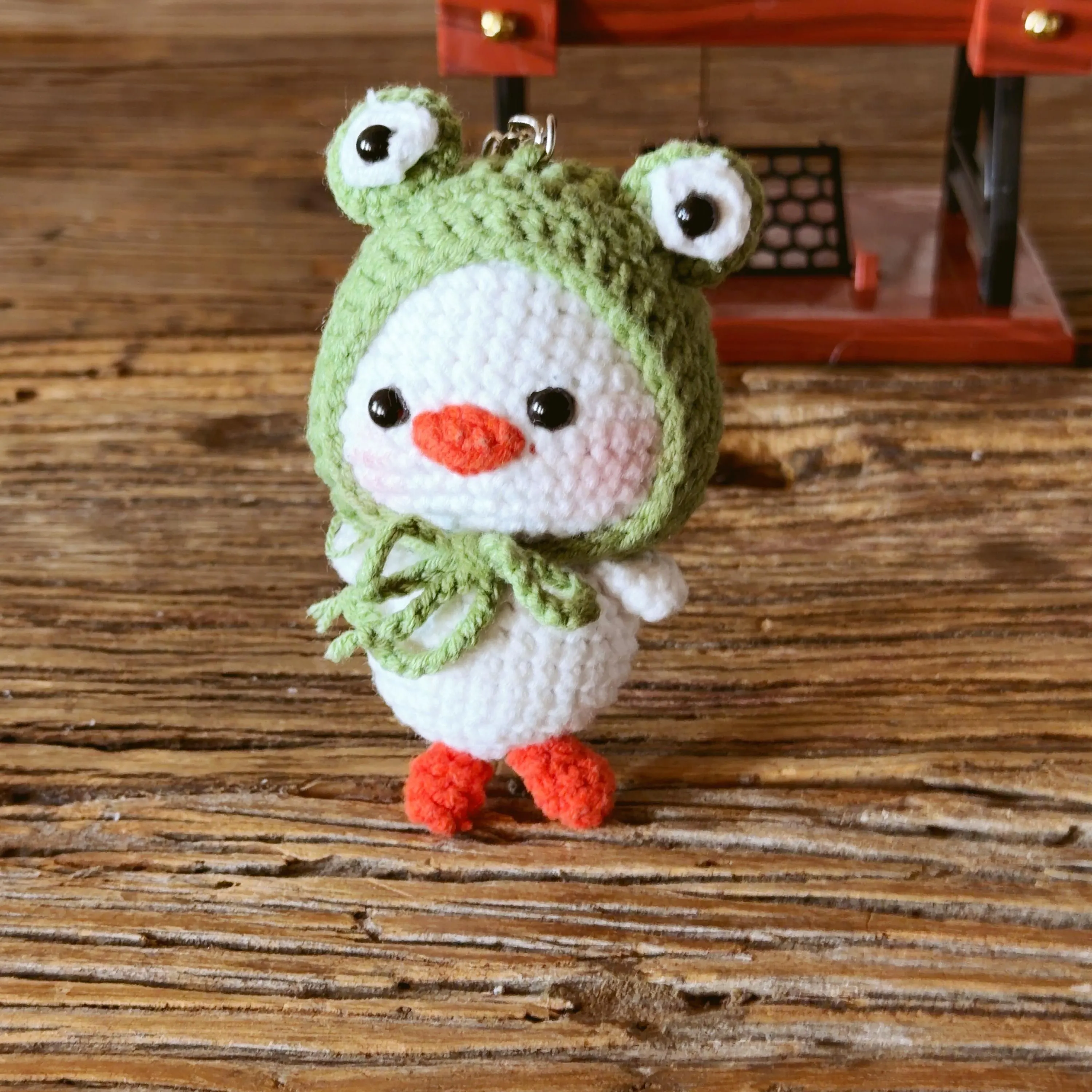 Crochet Duck in Frog Hat Keychain, product photo 6