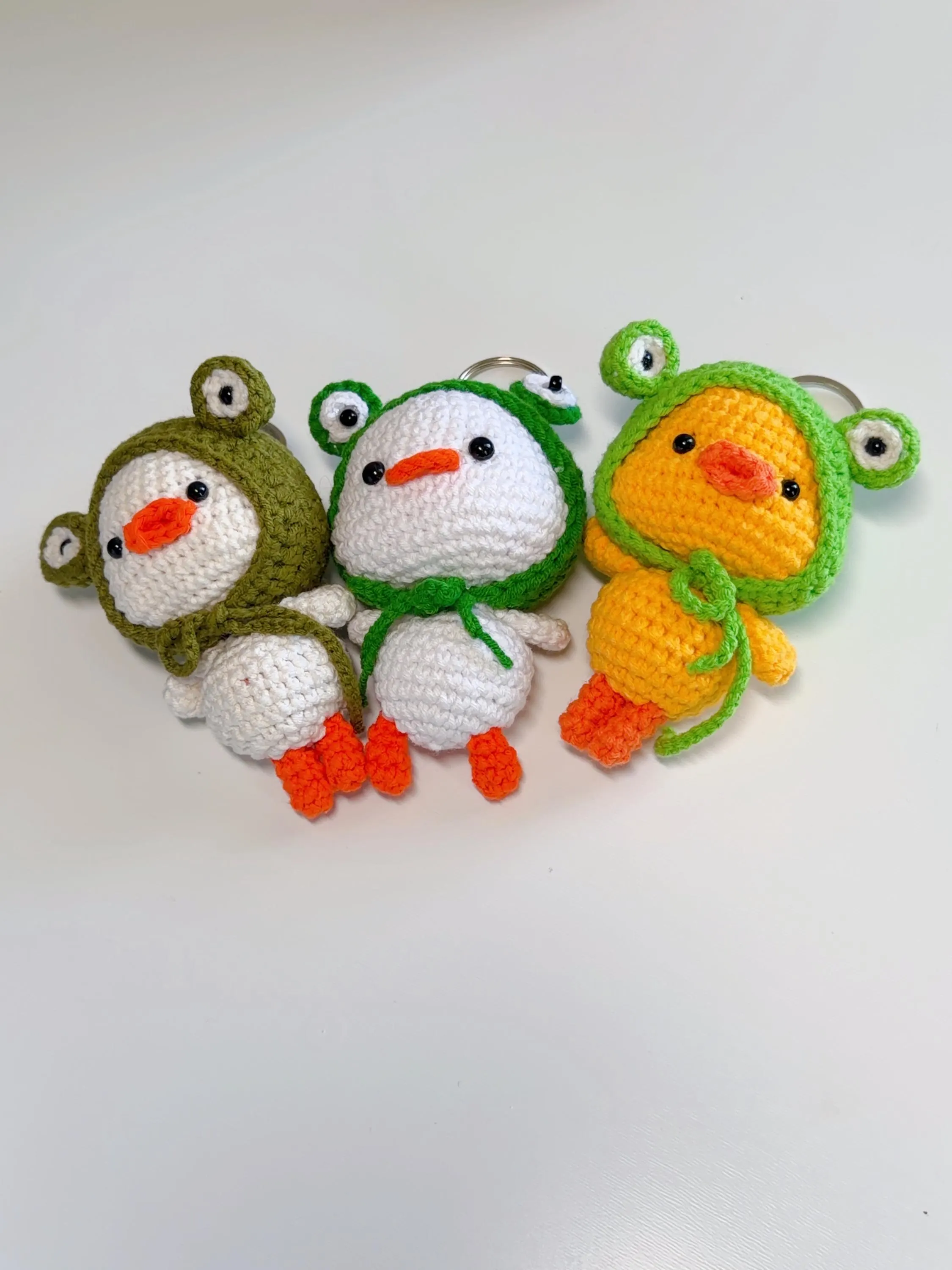 Crochet Duck in Frog Hat Keychain, product photo 1