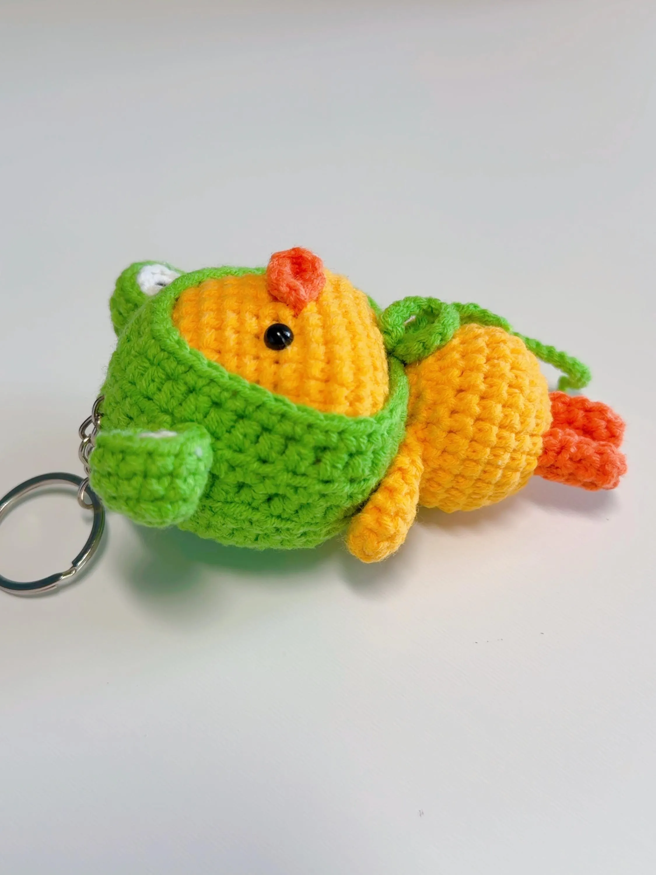 Crochet Duck in Frog Hat Keychain, product photo 4