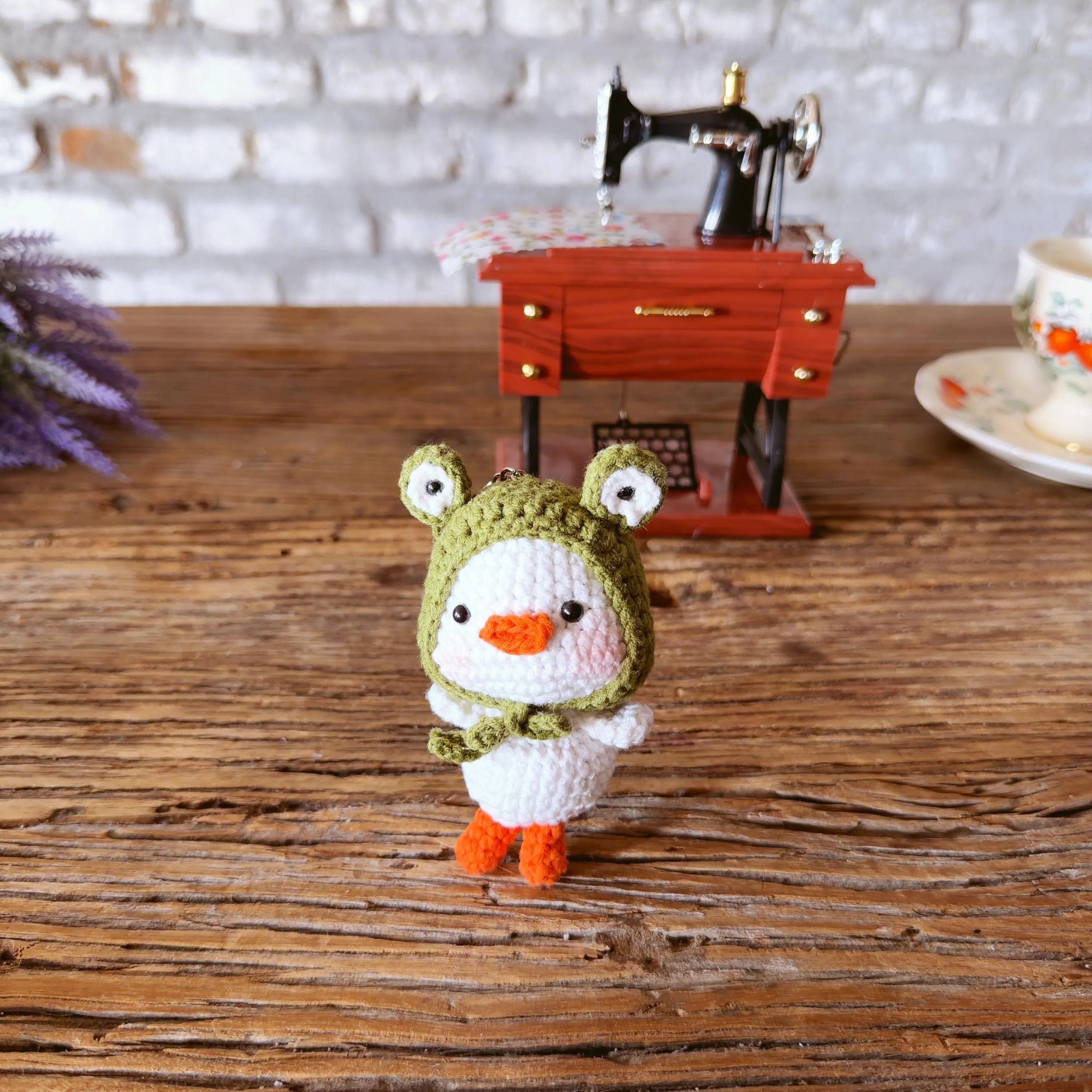 Crochet Duck in Frog Hat Keychain, product photo 5