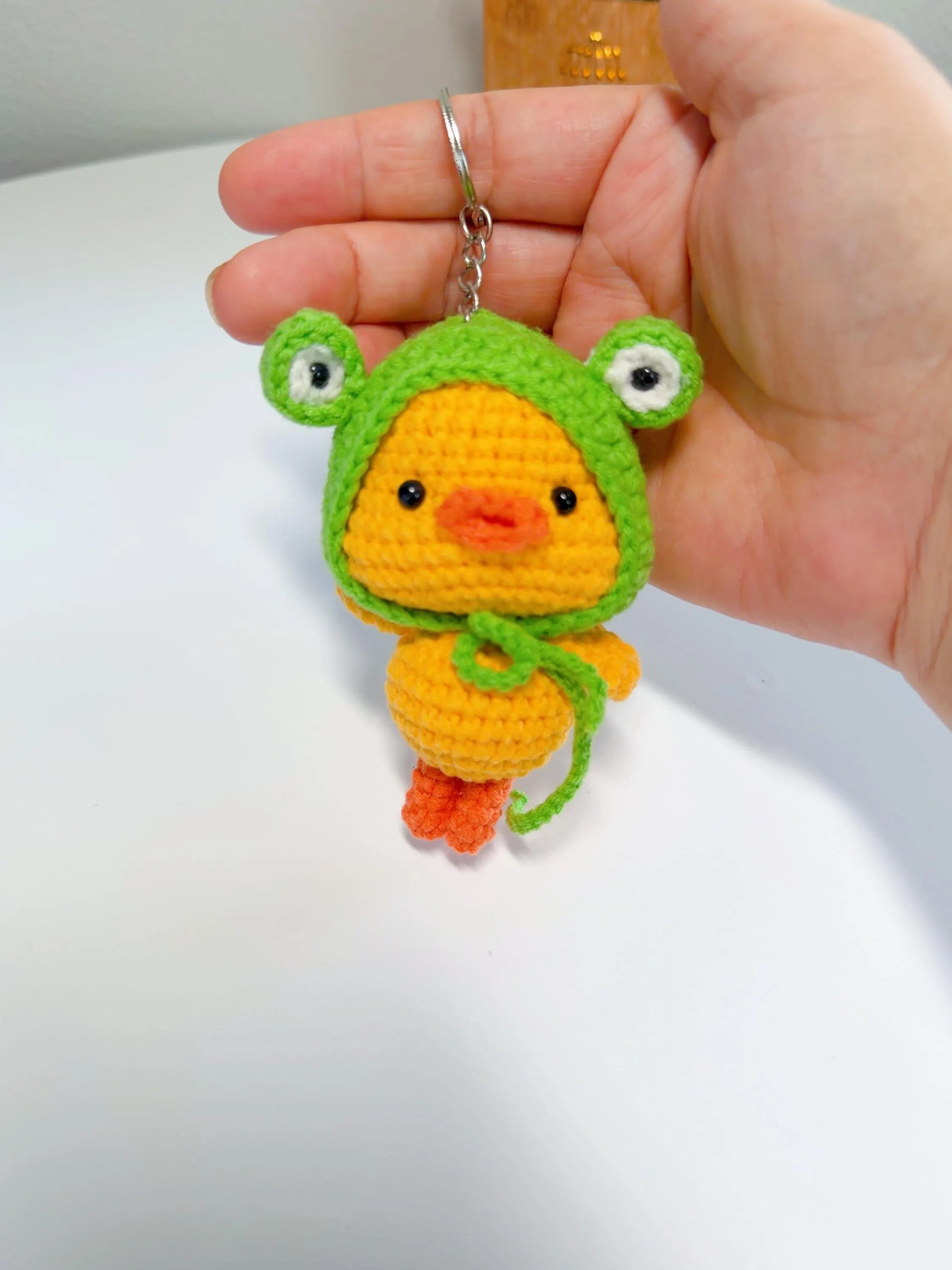 Crochet Duck in Frog Hat Keychain, product photo 13